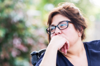 Picture of a woman looking into the distance